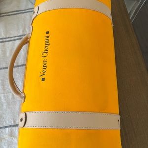 Veuve Clicquot orange champagne case and glass